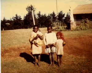 Mary Wanjiru and her sister Lucy, the baby on her back, and a friend. Photo credit: c. Jane H. Johann, Kiriko, Kenya, East Africa, 1976