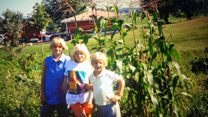  My daughters, 1996, Sara, Annie and Lara, standing by the little garden they planted.